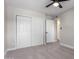 Spacious bedroom closet with mirrored sliding doors at 4432 E Belleview St, Phoenix, AZ 85008