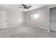 Bright bedroom with carpeting, closet, and window at 4432 E Belleview St, Phoenix, AZ 85008