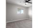 Bright bedroom with ceiling fan and plush carpeting at 4432 E Belleview St, Phoenix, AZ 85008