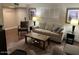 Bright and airy living room with a neutral color palette and plantation shutters at 5132 N 31St Way # 112, Phoenix, AZ 85016