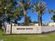 A photo of the Biltmore Estates sign framed by palm trees and lush landscaping at 5132 N 31St Way # 112, Phoenix, AZ 85016