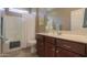 Bathroom with tub, toilet, and vanity with storage at 5181 W Buckskin Dr, Eloy, AZ 85131