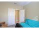 View down a hallway with doors to other rooms at 5181 W Buckskin Dr, Eloy, AZ 85131