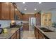 Eat-in kitchen with stainless steel appliances and granite countertops at 5181 W Buckskin Dr, Eloy, AZ 85131