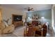 Comfortable living room featuring leather furniture and large TV at 5181 W Buckskin Dr, Eloy, AZ 85131