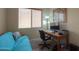 Home office with a comfortable couch and a workspace at 5181 W Buckskin Dr, Eloy, AZ 85131