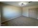 Spacious bedroom with neutral walls and carpet at 5313 W Osborn Rd, Phoenix, AZ 85031