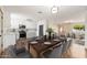 Modern dining room featuring wood flooring, an elegant table setting and a spacious design at 5313 W Osborn Rd, Phoenix, AZ 85031