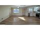 Spacious living area with hardwood floors and lots of natural light at 5313 W Osborn Rd, Phoenix, AZ 85031