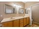 Double vanity bathroom with two sinks and mirrors at 6238 W Buckhorn Trl, Phoenix, AZ 85083