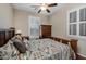 Bedroom with wooden bed frame and built-in shelving at 6238 W Buckhorn Trl, Phoenix, AZ 85083