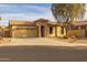 Single-story home with a two-car garage and landscaped front yard at 6238 W Buckhorn Trl, Phoenix, AZ 85083