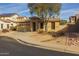 Single-story home with a two-car garage and landscaped front yard at 6238 W Buckhorn Trl, Phoenix, AZ 85083