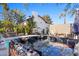 Backyard featuring a hot tub, patio area, lush landscaping, and serene outdoor space at 6811 E Juniper Ave, Scottsdale, AZ 85254