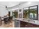 Bright kitchen with garden view, featuring stainless steel appliances and granite countertops at 6811 E Juniper Ave, Scottsdale, AZ 85254