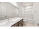 Bathroom featuring a large mirror, a sink and a shower over bath combination at 7163 W Oberlin Way, Peoria, AZ 85383