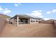 Home's back exterior with covered patio at 7163 W Oberlin Way, Peoria, AZ 85383