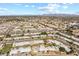 Aerial view of a community with numerous houses and landscaping at 7714 E Mariposa Dr, Scottsdale, AZ 85251