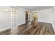 Bedroom with hardwood floors and glass block window at 7714 E Mariposa Dr, Scottsdale, AZ 85251