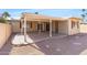 Backyard patio with covered area and access to house at 7714 E Mariposa Dr, Scottsdale, AZ 85251