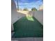 Small backyard with artificial turf and concrete patio at 8883 N 48Th Dr, Glendale, AZ 85302