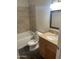 Clean bathroom with tub, toilet and vanity at 8883 N 48Th Dr, Glendale, AZ 85302