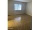 Bright bedroom with tiled floors and window at 8883 N 48Th Dr, Glendale, AZ 85302