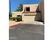 Tan two-story stucco home with red tile roof and attached garage at 8883 N 48Th Dr, Glendale, AZ 85302