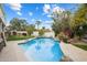 Backyard pool area featuring a manicured lawn and mature landscape and lots of privacy at 9504 E Sunnyside Dr, Scottsdale, AZ 85260