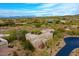 Desert home with unique architecture, lush native landscaping, and mountain views at 10040 E Happy Valley Rd # 300, Scottsdale, AZ 85255