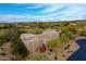 Aerial view of a single-story home with desert landscaping at 10040 E Happy Valley Rd # 300, Scottsdale, AZ 85255