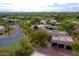 Aerial view of a luxurious single-story home in a desert community at 10040 E Happy Valley Rd # 300, Scottsdale, AZ 85255