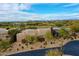 Aerial shot of a single-story home in a desert community at 10040 E Happy Valley Rd # 300, Scottsdale, AZ 85255