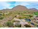 Desert home with a private backyard, native landscaping, and mountain views at 10040 E Happy Valley Rd # 300, Scottsdale, AZ 85255