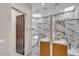 Modern bathroom with a marble shower, soaking tub, and dual sink vanity at 10040 E Happy Valley Rd # 300, Scottsdale, AZ 85255
