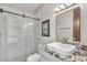 Bathroom featuring a frameless glass shower, marble counters, and modern fixtures at 10040 E Happy Valley Rd # 300, Scottsdale, AZ 85255