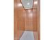 Custom walk-in closet with wood cabinets and drawers, offering ample storage at 10040 E Happy Valley Rd # 300, Scottsdale, AZ 85255