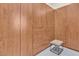 Well-organized walk-in closet with wood cabinetry and ample storage space at 10040 E Happy Valley Rd # 300, Scottsdale, AZ 85255