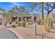 Charming single-story home with desert landscaping and stone accents at 10040 E Happy Valley Rd # 300, Scottsdale, AZ 85255
