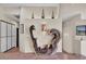 Unique wooden sculpture in hallway adds artistic flair at 10040 E Happy Valley Rd # 300, Scottsdale, AZ 85255