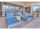 Relaxing patio featuring comfortable lounge chairs and seamless indoor-outdoor living with desert views at 10040 E Happy Valley Rd # 300, Scottsdale, AZ 85255