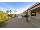 Large backyard with covered patio and mature citrus tree at 11132 E Bellflower Ct, Sun Lakes, AZ 85248