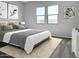 Spacious bedroom with gray walls and a comfortable bed at 15787 W Mariposa Grande --, Surprise, AZ 85387