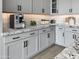 Espresso machine on the granite countertop in a modern kitchen at 15787 W Mariposa Grande --, Surprise, AZ 85387
