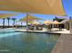 Resort-style pool with shade structures and seating at 15787 W Mariposa Grande --, Surprise, AZ 85387