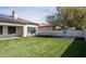 Backyard with artificial turf, trampoline, hammock and patio at 1723 W Brianna Rd, Phoenix, AZ 85085