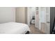Bright bedroom featuring closet and an ensuite bathroom at 1723 W Brianna Rd, Phoenix, AZ 85085