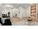 Spacious living room with an open floor plan, modern decor, and hardwood flooring at 1723 W Brianna Rd, Phoenix, AZ 85085