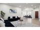 Stylish living room with a modern sofa, elegant decor, and plenty of natural light at 1723 W Brianna Rd, Phoenix, AZ 85085