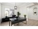 Bright office featuring a modern desk, ample natural light, and a minimalist design at 1723 W Brianna Rd, Phoenix, AZ 85085
